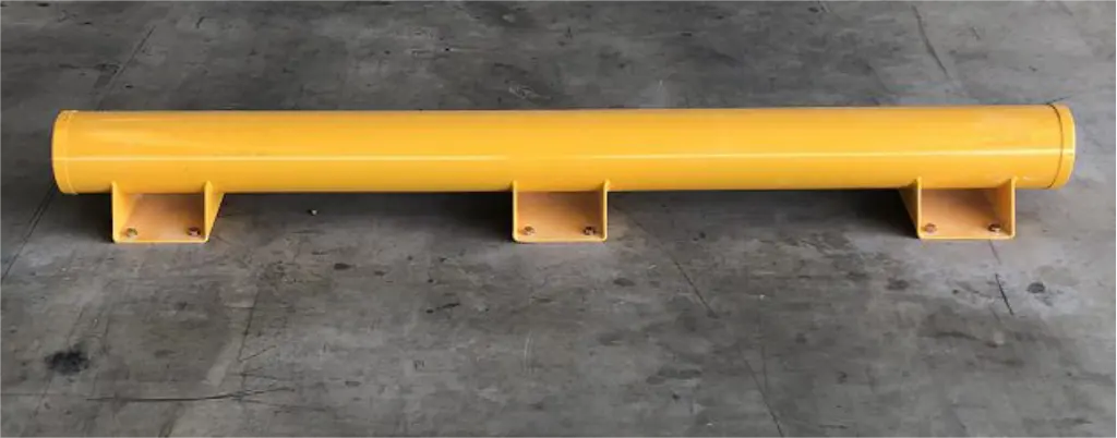A yellow parking curb made of steel.